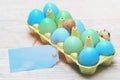 Traditional eggs painted in bright color inside carton box Royalty Free Stock Photo