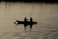 Traditional egyptian bedouin fisherman in silhouette on nile river