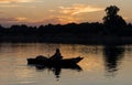 Traditional egyptian bedouin fisherman silhouette at sunset