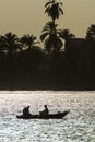 Traditional egyptian bedouin fisherman silhouette at sunset