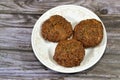 Traditional Egyptian fried falafel balls, green burger, made of ground chickpeas and broad beans, deep fried balls or patty-shaped