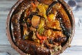 Traditional Egyptian mixture of lamb meat, sausage mumbar intestines filled with rice, kawareh trotters cow feet, pieces of cooked