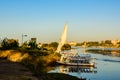 Traditional egyptian vessel felucca moored on Nile river in Luxor, Egypt Royalty Free Stock Photo