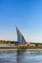 Traditional egyptian vessel felucca moored on Nile river in Luxor, Egypt Royalty Free Stock Photo