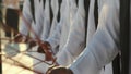 Traditional Emirati Al Ayala male dance, cultural UAE heritage, hands in frame