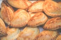 Traditional Empanadas stuffed with minced beef, pepper and corn, served with Aji Picante sauce Royalty Free Stock Photo