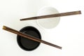 Traditional empty rice bowl with bamboo chopsticks on old wood p Royalty Free Stock Photo