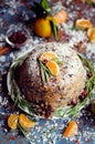 Traditional English Christmas plum pudding, sugar icing