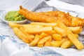 Fish and Chips with mushy peas served in the Pub Royalty Free Stock Photo