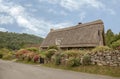 Traditional English house with thatched roof. Royalty Free Stock Photo