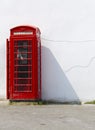 Traditional english phone box on a street in england