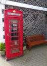 Traditional english phone box on a street in england Royalty Free Stock Photo