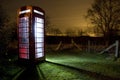 Traditional english phonebox at night