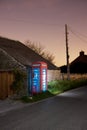 Traditional english phonebox at night Royalty Free Stock Photo