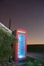 Traditional english phonebox at night Royalty Free Stock Photo