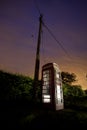 Traditional english phonebox at night Royalty Free Stock Photo