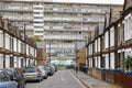 Traditional English terraced houses with huge council block in the background Royalty Free Stock Photo