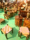 Traditional ethnic furniture for sale in an outdoor exhibition