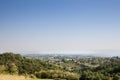 Typical European countryside landscape, with farms, agricultural fields, trees, in a valley , in Sopot Municipality Central Serbia Royalty Free Stock Photo