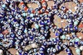 Traditional evil eye bead bracelets on the table