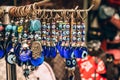 Traditional evil eye bead - protection amulet at souvenir store. Popular touristic souvenir and talisman in different