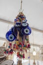 Traditional evil eye bead. Souvenir. Blurred background. To bring good luck