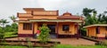 Traditional exterior architecture design of Kerala model home with surroundings