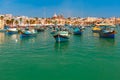 Taditional eyed boats Luzzu in Marsaxlokk, Malta Royalty Free Stock Photo