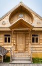 Traditional facade of a Russian rustic wooden house in the Altai Mountains