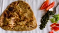 Flat Lay of authentic Punjabi dish, parantha or paratha served with coriander mint chutney,salad.Closeup,dhaba style,indian food. Royalty Free Stock Photo