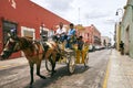Merida / Yucatan, Mexico - May 31, 2015: Horse carriage service on the street of Merida city