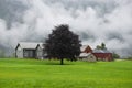 Traditional farm house and barn in Norway. Royalty Free Stock Photo