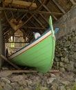 Traditional Faroese fishing boat, old boathouse