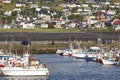 Traditional faroese village with harbor beach and houses. Sorvagur