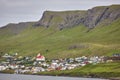 Traditional faroese village in Suduroy island. Fjord landscape. Tvoroyri