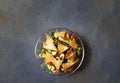Traditional Fattoush salad with vegetables and pita bread. Levantine, Arabic, Middle Eastern cuisine