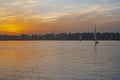 Traditional felluca sailing boat on Nile River at sunset Royalty Free Stock Photo