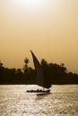 Traditional felluca sailing boat silhouette at sunset Royalty Free Stock Photo