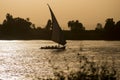 Traditional felluca sailing boat silhouette at sunset Royalty Free Stock Photo