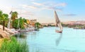 Traditional felucca in the Nile river, Aswan, Egypt, beautiful summer scenery Royalty Free Stock Photo