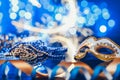 Traditional female carnival venetian mask on bokeh background. Masquerade, Venice, Mardi Gras, Brazil concept