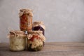 Traditional fermented, pickled, canned and pickled vegetables in Glass jars. cauliflower, cucumbers, paprika, onions and red Royalty Free Stock Photo