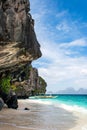 Banca boat on the pristine beach of Entalula island in El nido, region of Palawan in the Philippines. Vertical view Royalty Free Stock Photo