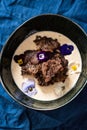 Traditional Finnish Easter rye pudding, with cream Royalty Free Stock Photo