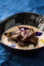 Traditional Finnish Easter rye pudding, with cream Royalty Free Stock Photo