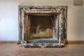 Traditional fireplace in a living room Royalty Free Stock Photo