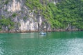 Traditional fisherman boat in HaLong Bay