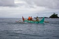 Indonesian traditional fishing boat in sea with horizon in background