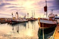 Traditional fisherman boats lying in the harbor of Husavik