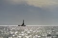 Fisherman dhow boat during sunset on Indian ocean in island Zanzibar, Tanzania, East Africa Royalty Free Stock Photo